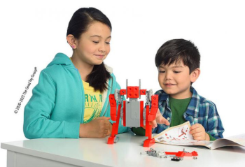 elementary children building a robot together