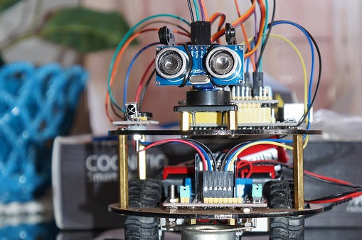 STEM toy robot built by hand for older kids