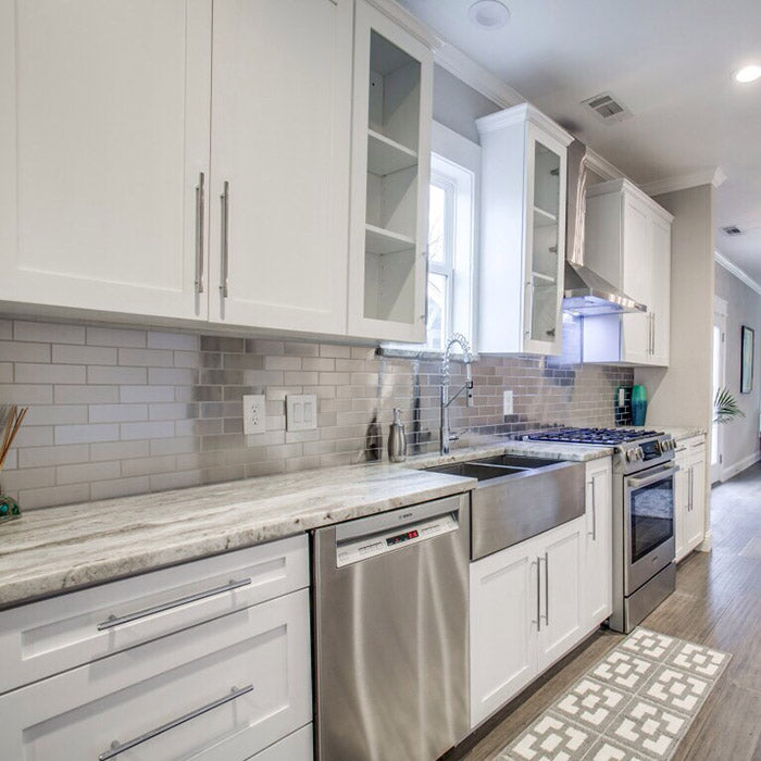 grey granite countertops with brown cabinets