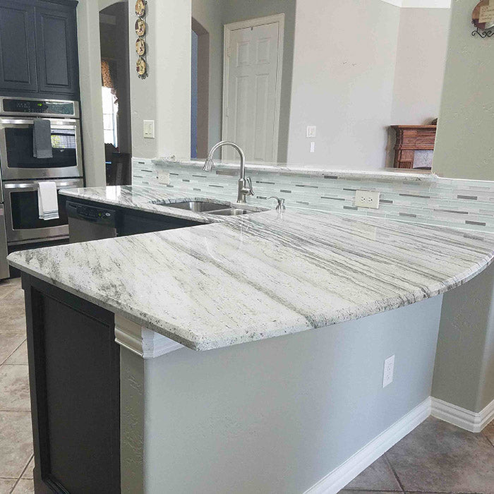 Riverwhitegranitekitchenpeninsulacountertops ?v=1586709955