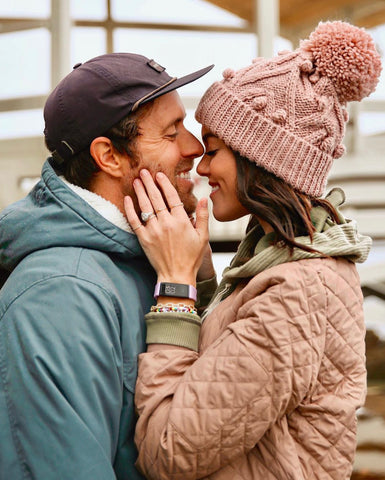 images of a happy couple woman wearing pink hat