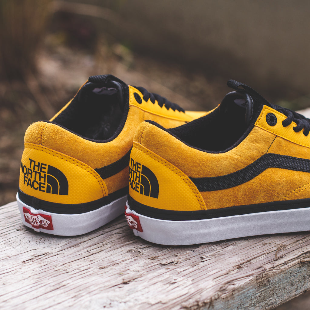 north face yellow vans