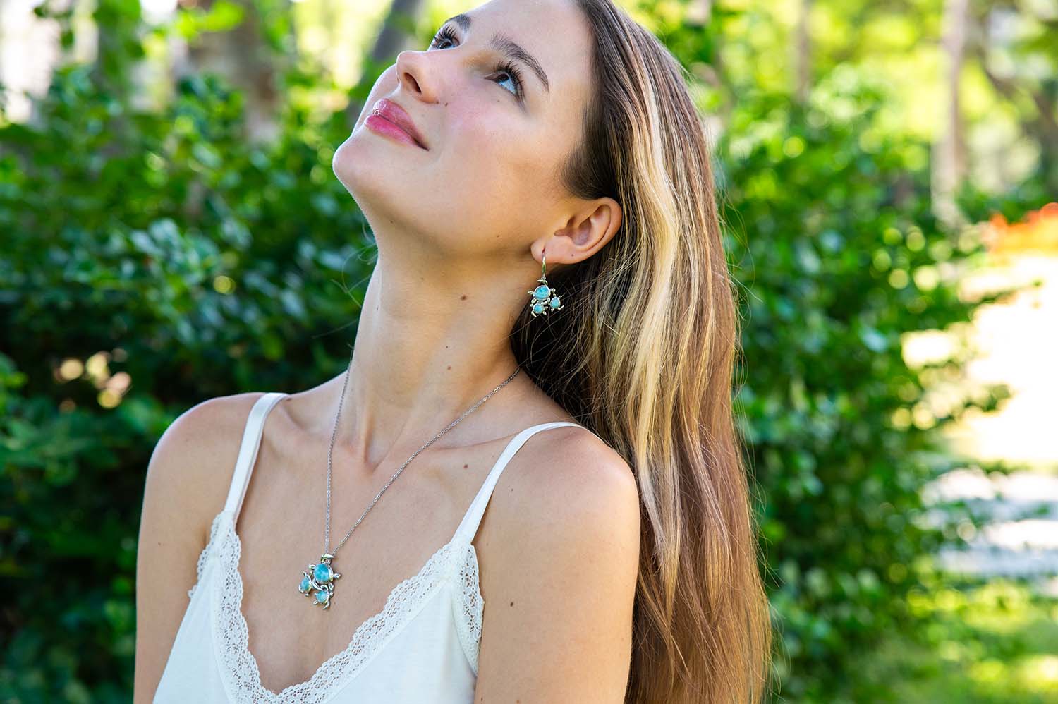 Larimar Ohana Honu Jewelry featuring three sea turtles in set of pendant and earrings