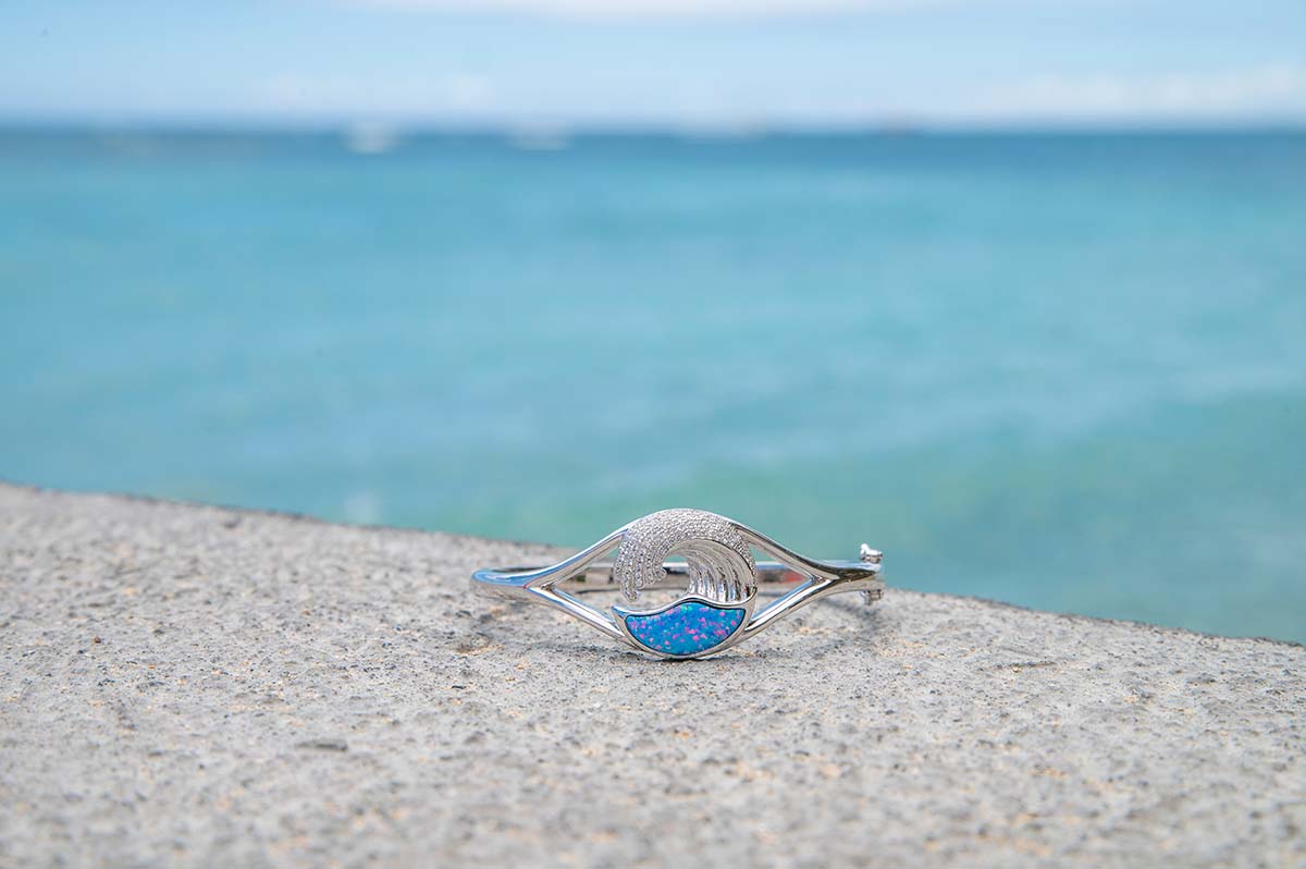 Sterling Silver Sustainable Ocean Blue Opal award winning Ocean Wave Bangle with white topaz gemstones