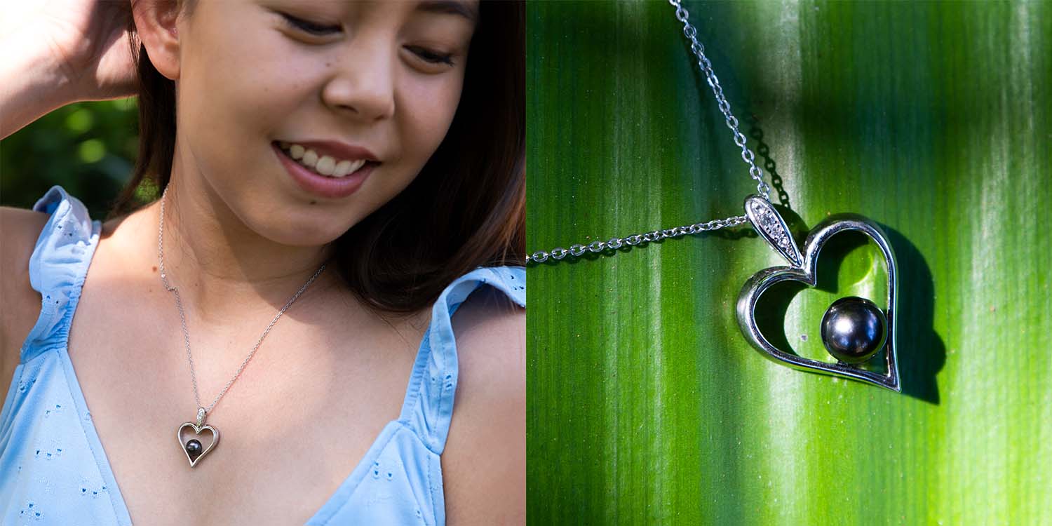 heart pendant features a Tahitian Black Pearl inside a sterling silver heart