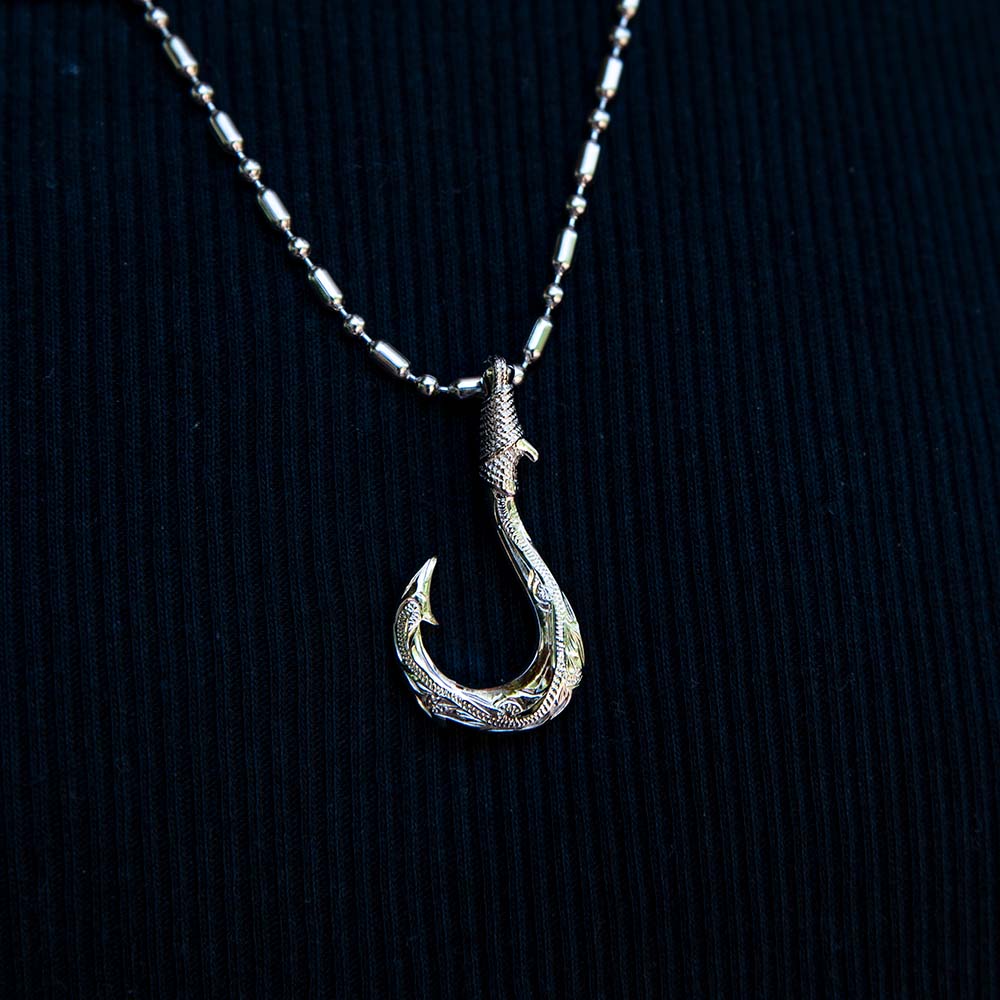 sterling silver hang-engraved fish hook pendant with traditional Hawaiian scroll or wave detailing