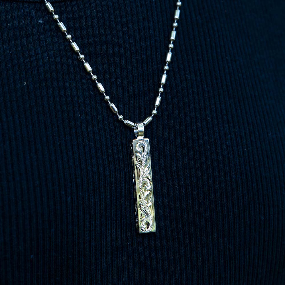 sterling silver traditionally engraved bar pendant with Hawaiian scroll or wave detailing