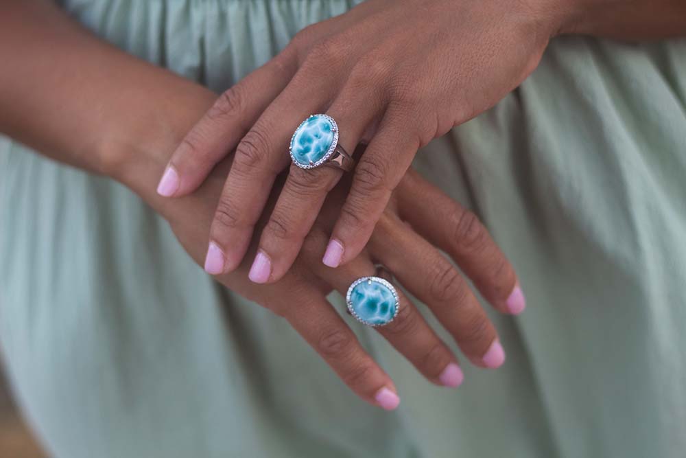 ocean blue larimar rings worn on each hand