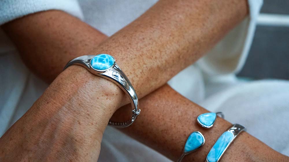Larimar bangles worn on a woman's wrist