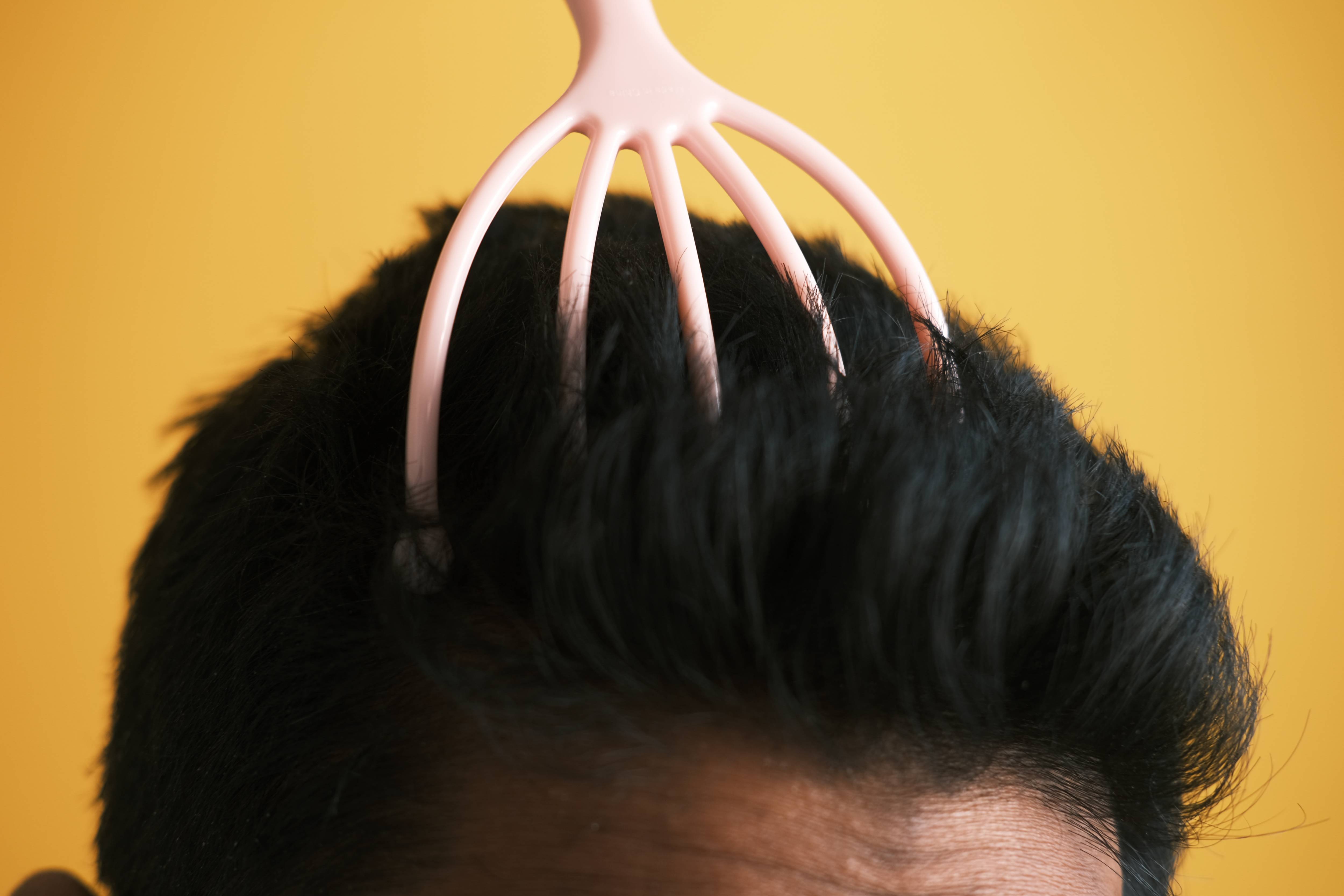 men-having-a-scalp-massage-with-a-brush-2023-11-27-05-11-35-utc (1).jpg__PID:930a9bbd-2c52-462a-8bb3-20d318745c79