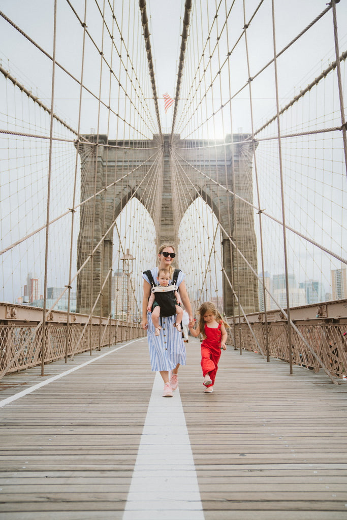 new york walking across the brooklyn bridge with kids