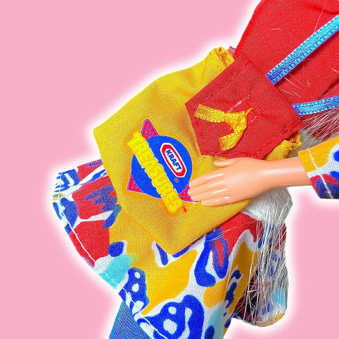 Close Up of the Kraft Mac and Cheese bag Barbie holds