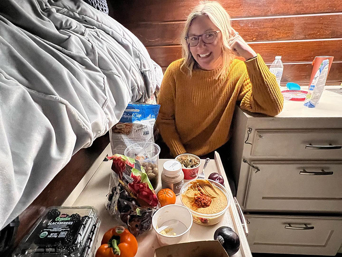 Paige Pierces enjoys a stack with her partner, Alyssa, while eating in their van.