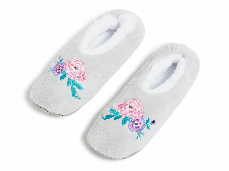 light gray fleece slippers with floral pattern on front