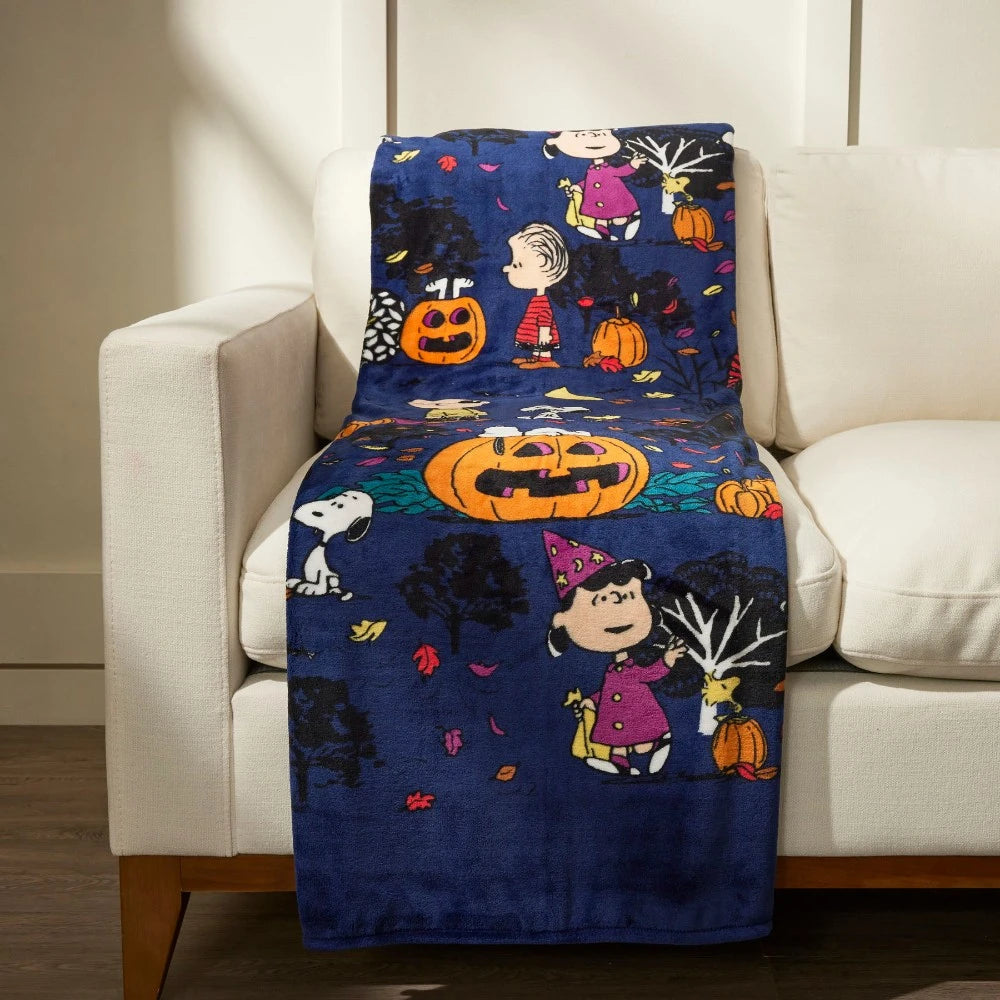 Vera Bradley throw blanket in Halloween Peanuts pattern