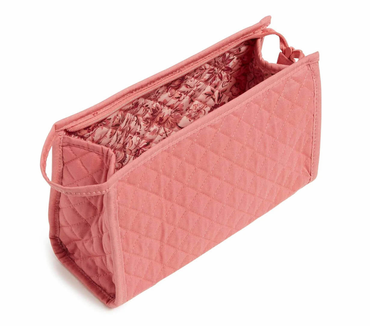 pink quilted cosmetic bag open showing pattern inside