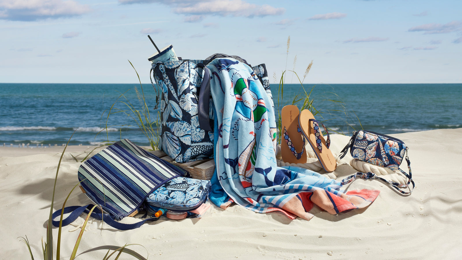bags and blankets on beach 