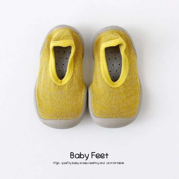 yellow baby shoes