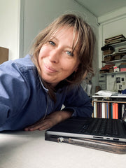 Photographer Line Thit Klein in her work space, self-portrait