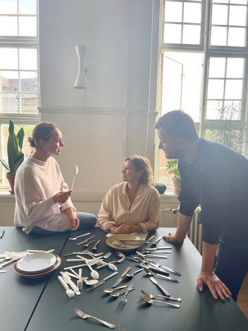 Designer Ulrik Nordentoft discussing Alma Cutlery with Stilleben's Ditte Reckweg and Jelena Schou Nordentoft