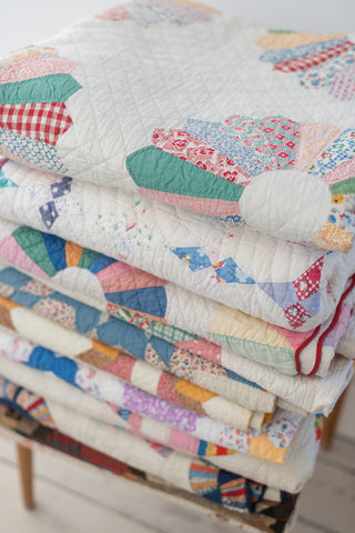 Daisy and Beulah stack of vintage patchwork quilts