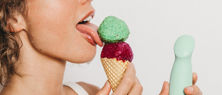 Woman licking ice cream