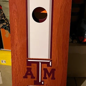 Texas A&M cornhole boards at the tailgate