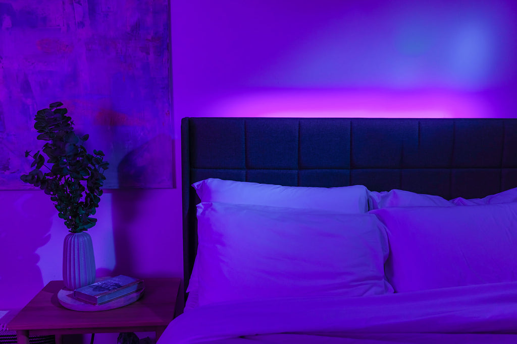 pink and purple LED lighting in bedroom