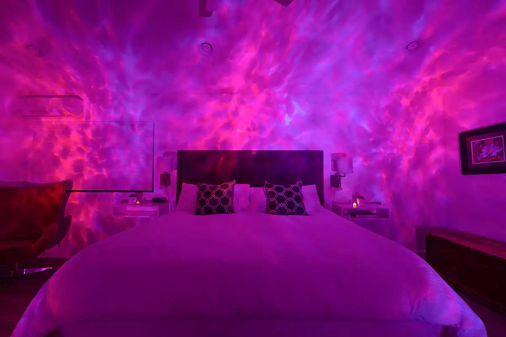 bedroom with sky lite evolve smart galaxy projector in pink