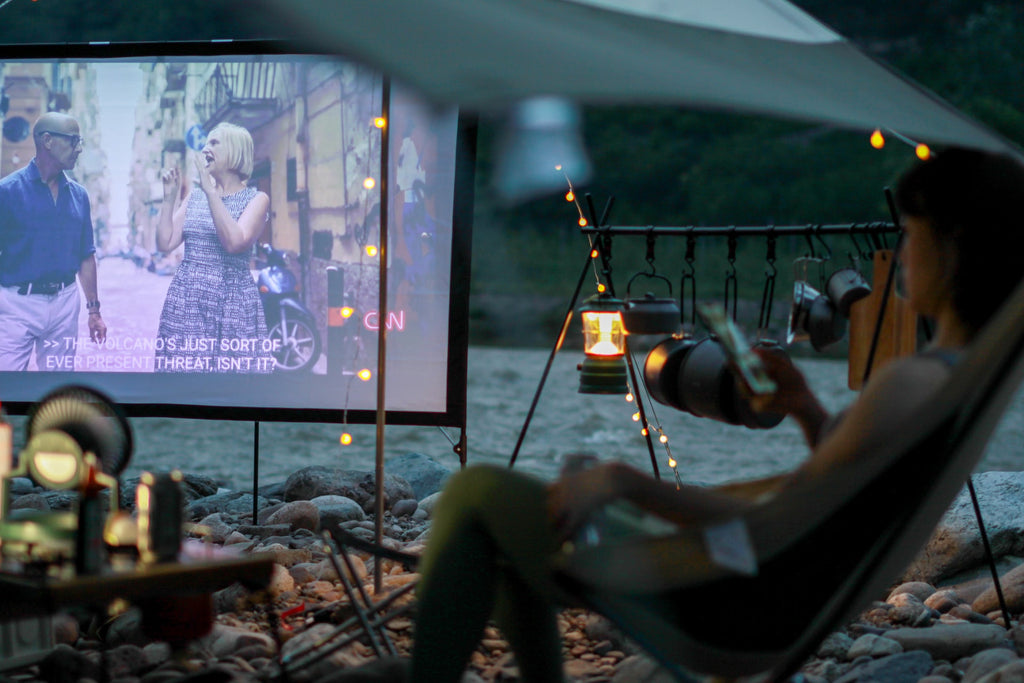 glamping with portable movie screen