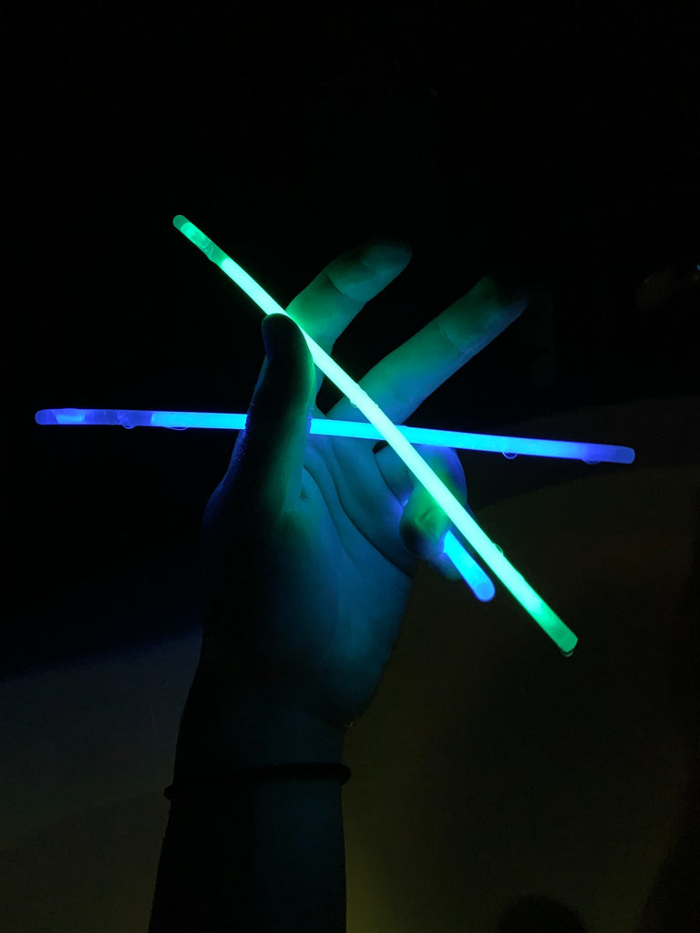 blue and green glow sticks