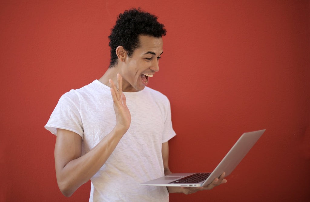 excited teen on video call