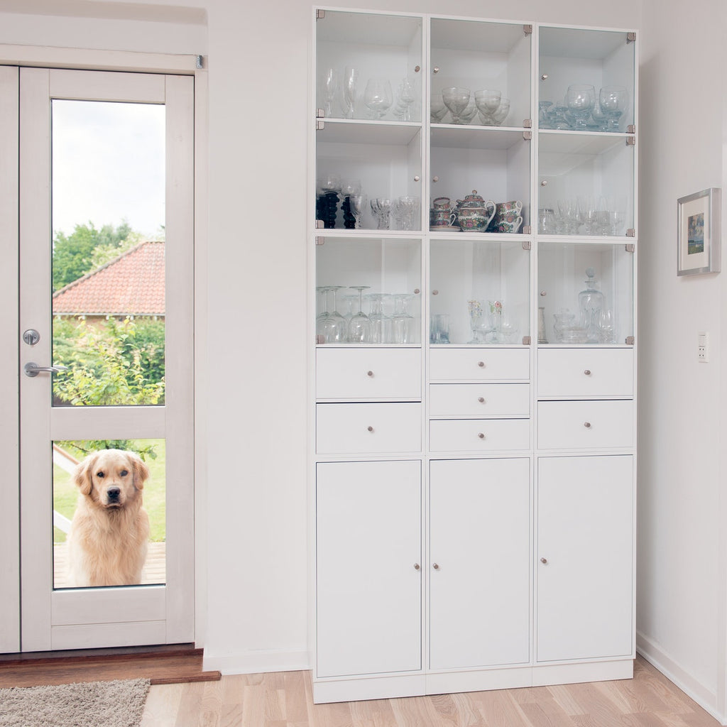 white cabinet with dog