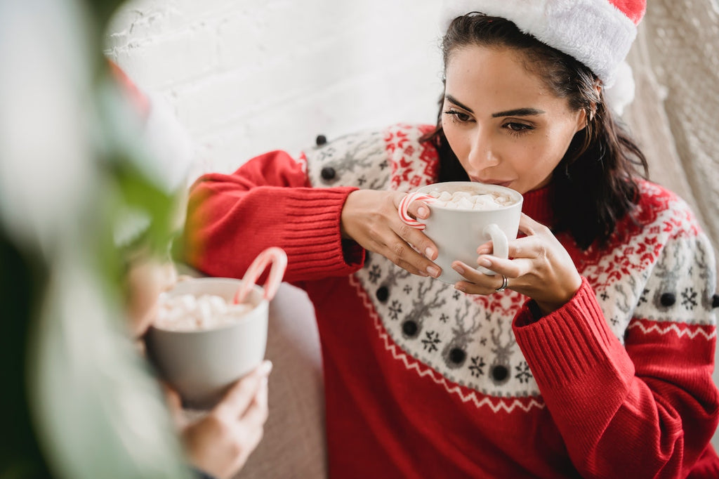 mom and child drinking hot chocolate