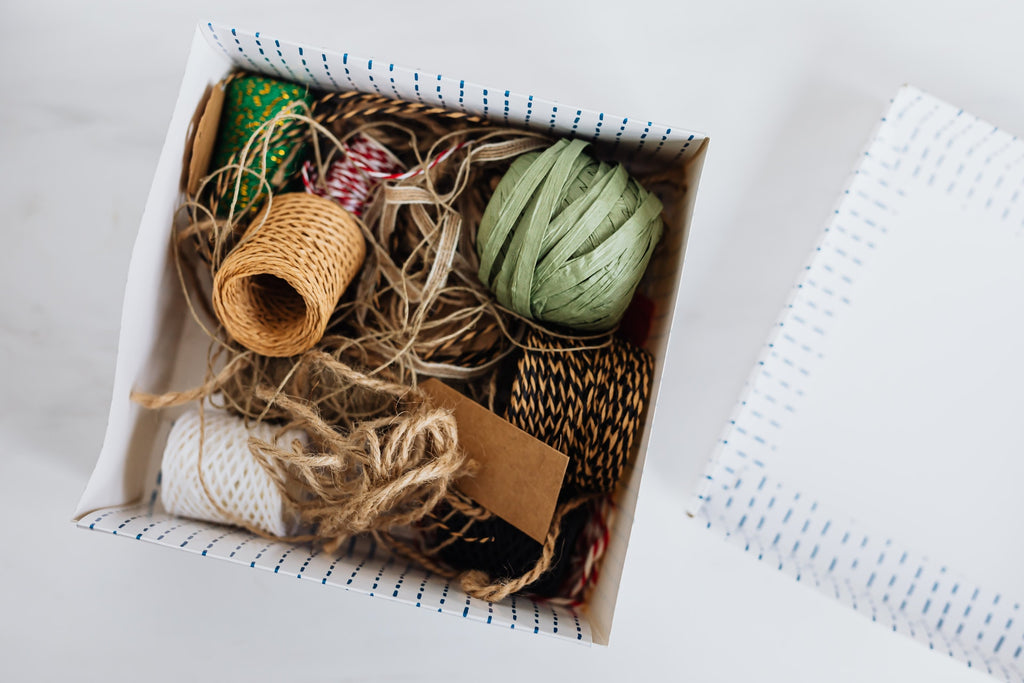 box of ribbons and thread