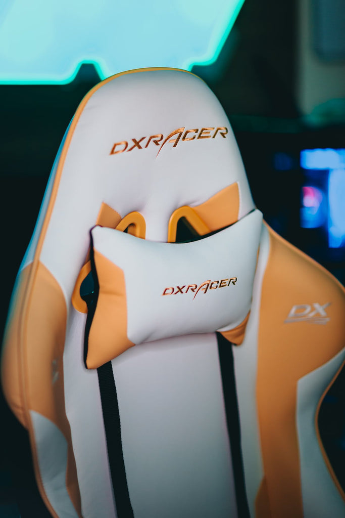 white and orange gaming chair