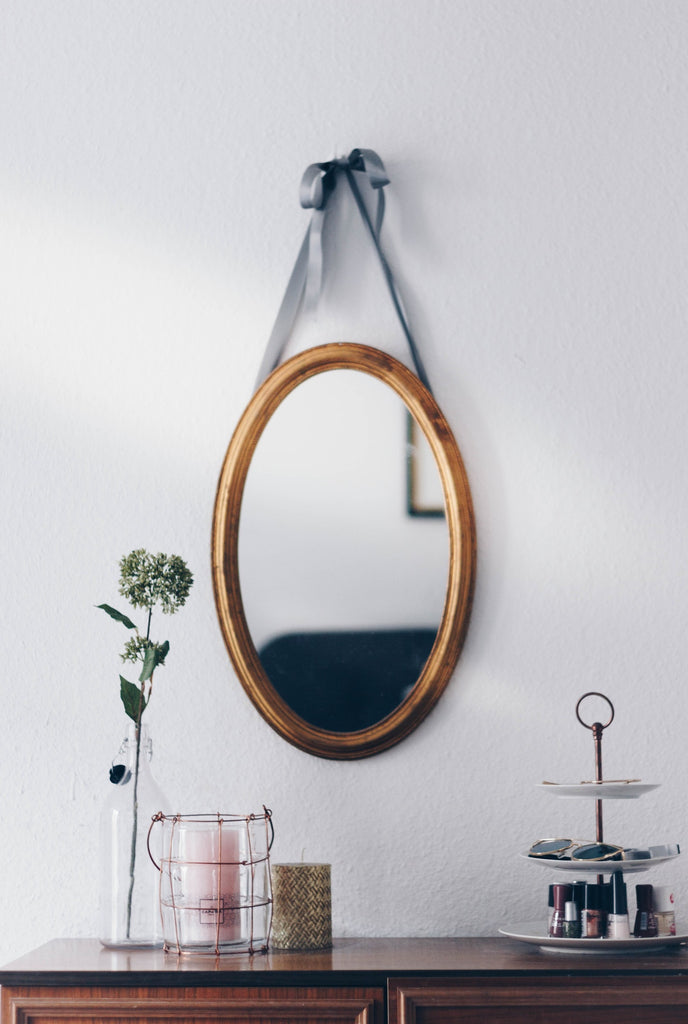 hanging oval mirror