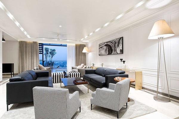 contemporary monochrome livingroom with pattern and pop of colour