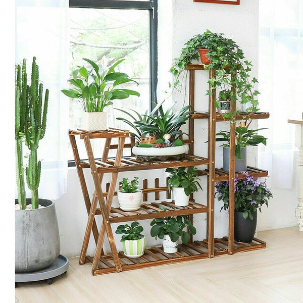 artificial plants on decorative wooden planter