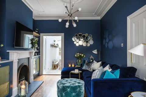 navy blue wall and sofa