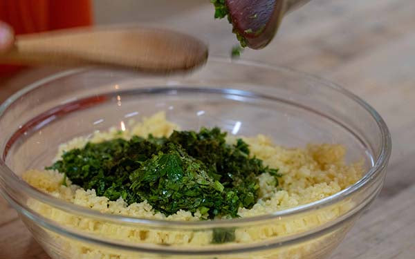 To make the couscous, prepare according to the package directions. After the couscous has rested off the heat, fluff with a fork. Add in the lime juice, lime zest, fresh herbs, spices, and olive oil.