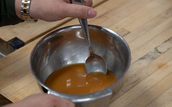 Whisk the sauce ingredients together. Add in cubed tofu to marinate.