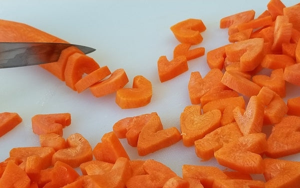 Now slice each long cylindrical carrot heart into ¼ “-thick pieces. Yield should be about 2 cups. 