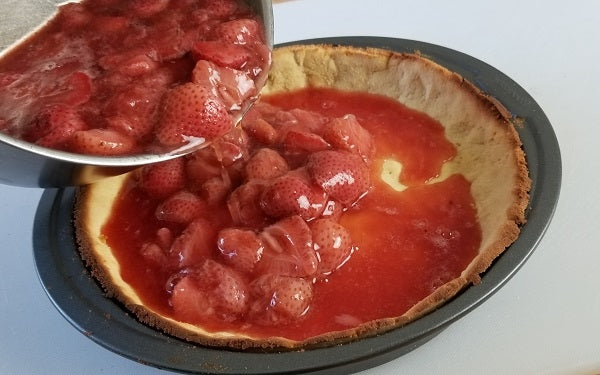 Pour the strawberry filling into the baked pie crust. Refrigerate overnight to set.