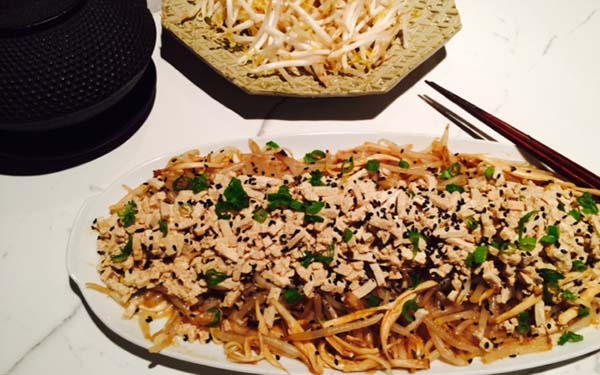 Place bean sprouts on a serving plate and top with marinated tofu and mushrooms; drizzle accumulated dressing over dish.