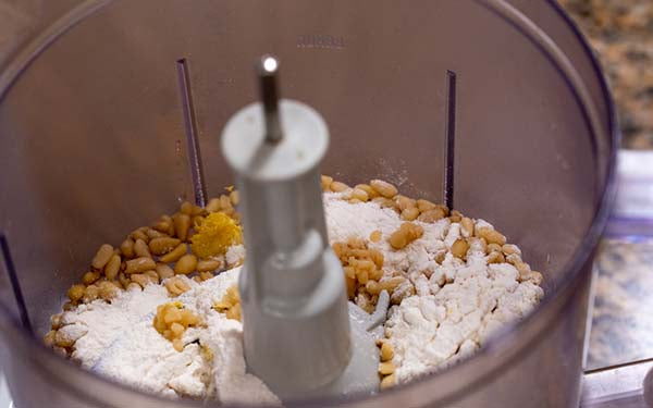 Mix all ingredients together in a food processor until it’s the consistency of grated Parmesan cheese. Set aside.