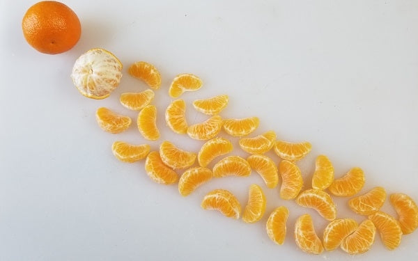 Peel the tangerines, then separate the segments and remove most of the white pith from each segment.