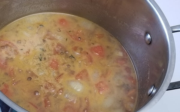 Add lentils and chicken stock. Bring to a boil, then reduce heat, add in the tomatoes, cumin, thyme, salt and pepper. Simmer for 10 minutes. Turn off flame and stir in lemon juice.