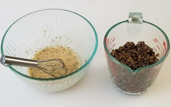 In a medium bowl combine the red wine vinegar, Dijon, thyme, and the remaining TBS of oil; whisk until an emulsified dressing. Add lentils, stir to combine, then set aside to allow the lentils to absorb the dressing.