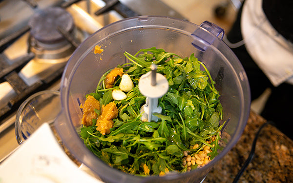 Image of pesto ingredients in processor